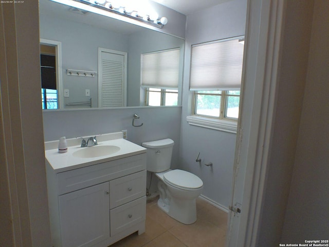 427 Olney, San Antonio, TX 78209 - half bath with vanity, toilet, and tile patterned flooring