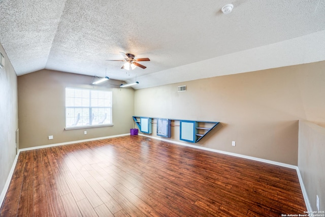 756 County Road 245, Hondo, TX 78861 - spare room featuring a ceiling fan, a textured ceiling, a smoke detector, wood finished floors, and baseboards