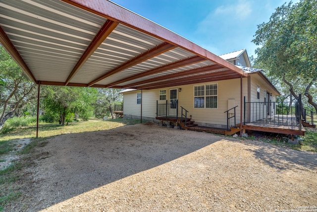 756 County Road 245, Hondo, TX 78861 - view of front of home with metal roof and an attached carport