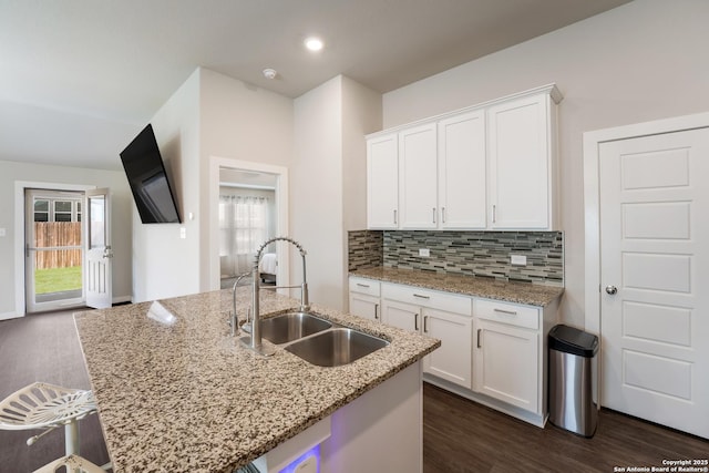 6955 Shiraz Way, Converse, TX 78109 - kitchen featuring a sink, dark wood finished floors, white cabinets, and recessed lighting