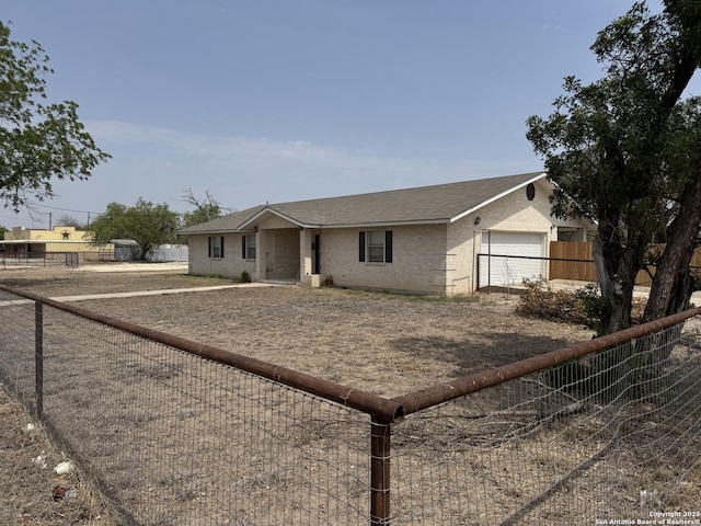 314 US Highway 57, La Pryor, TX 78872 - ranch-style home featuring a garage