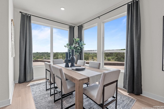 20675 Huebner Rd, San Antonio, TX 78258 - dining space featuring light wood-type flooring, baseboards, and recessed lighting