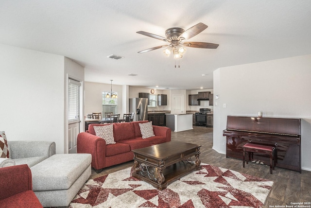 14506 Tundra Swan, San Antonio, TX 78253 - living area with ceiling fan, dark wood-type flooring, and baseboards