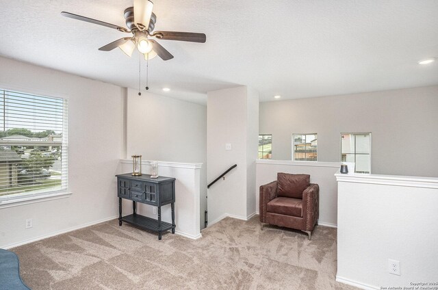 14506 Tundra Swan, San Antonio, TX 78253 - sitting room featuring an upstairs landing, carpet flooring, a ceiling fan, baseboards, and recessed lighting