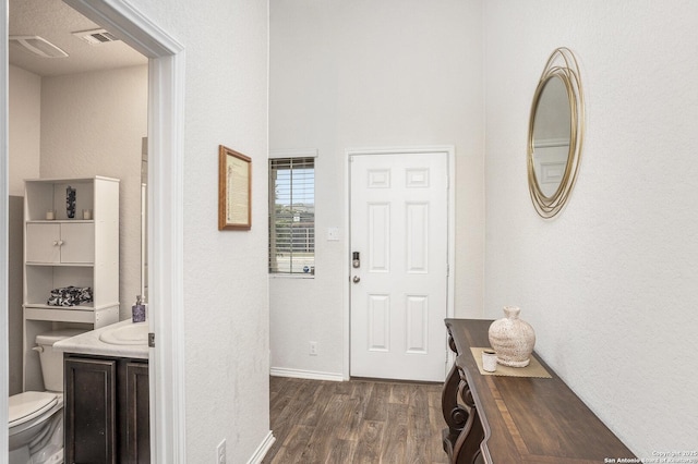 14506 Tundra Swan, San Antonio, TX 78253 - entrance foyer with dark wood-style floors, baseboards, and a textured wall