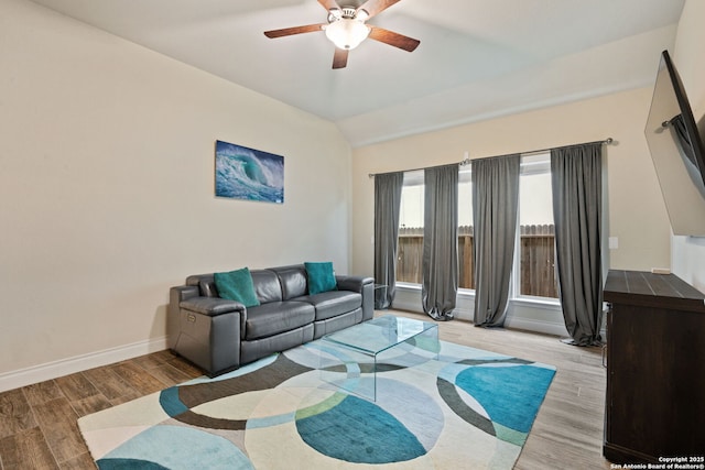 7938 Cibolo, Boerne, TX 78015 - living room featuring a ceiling fan, wood finished floors, vaulted ceiling, and baseboards