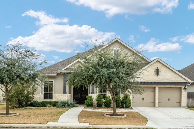 7938 Cibolo, Boerne, TX 78015 - view of front of property with stone siding, a garage, concrete driveway, a front yard, and roof with shingles
