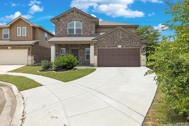 11423 Roadrunner, San Antonio, TX 78245 - traditional-style home with concrete driveway, brick siding, and a garage