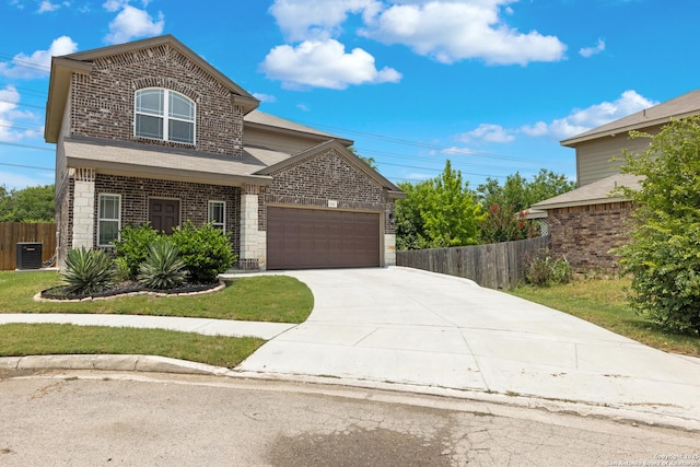11423 Roadrunner, San Antonio, TX 78245 - traditional-style home with a garage, brick siding, central AC unit, and concrete driveway