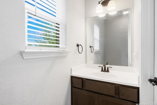 11423 Roadrunner, San Antonio, TX 78245 - bathroom with vanity and a textured wall