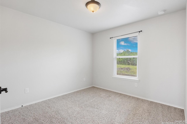11423 Roadrunner, San Antonio, TX 78245 - carpeted empty room with a smoke detector and baseboards