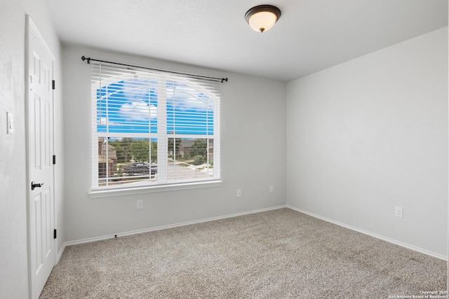 11423 Roadrunner, San Antonio, TX 78245 - carpeted spare room with baseboards