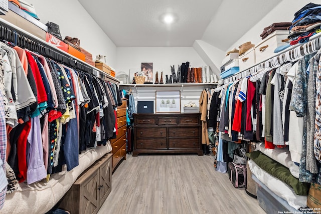 5481 Reverence, Bulverde, TX 78163 - walk in closet with wood finished floors