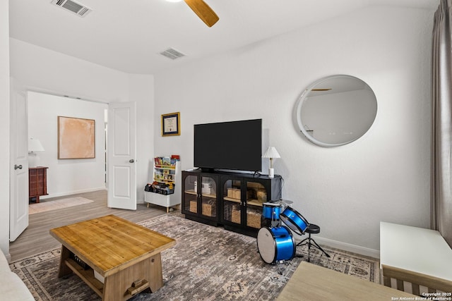 5481 Reverence, Bulverde, TX 78163 - living area featuring baseboards, wood finished floors, and a ceiling fan