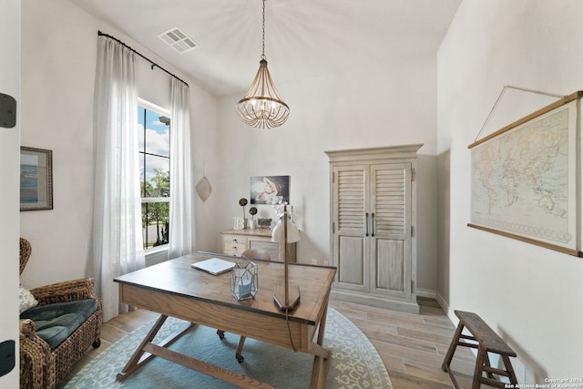 122 Indigo Bnd, Boerne, TX 78006 - office with wood finish floors, a chandelier, and baseboards