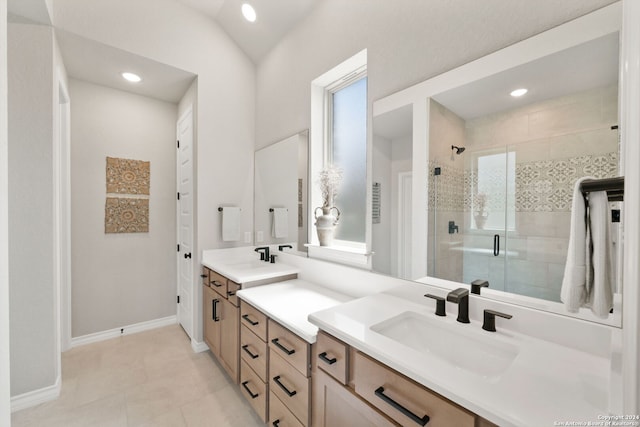 122 Indigo Bnd, Boerne, TX 78006 - full bathroom featuring double vanity, a stall shower, baseboards, recessed lighting, and tile patterned floors