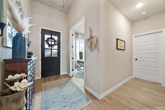 122 Indigo Bnd, Boerne, TX 78006 - entryway featuring wood finished floors and baseboards