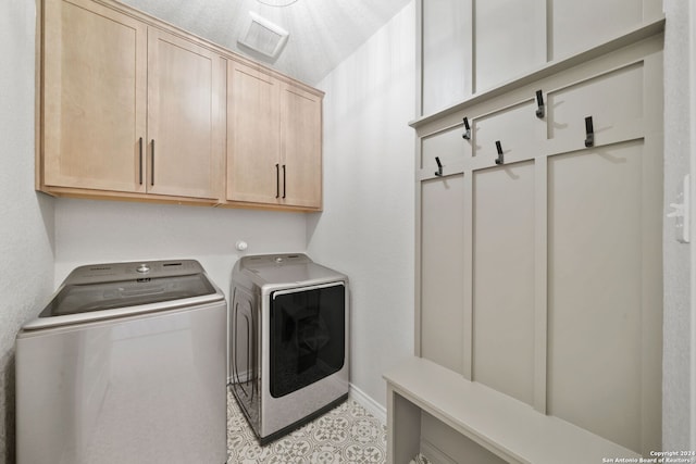 122 Indigo Bnd, Boerne, TX 78006 - washroom with separate washer and dryer, cabinet space, and baseboards