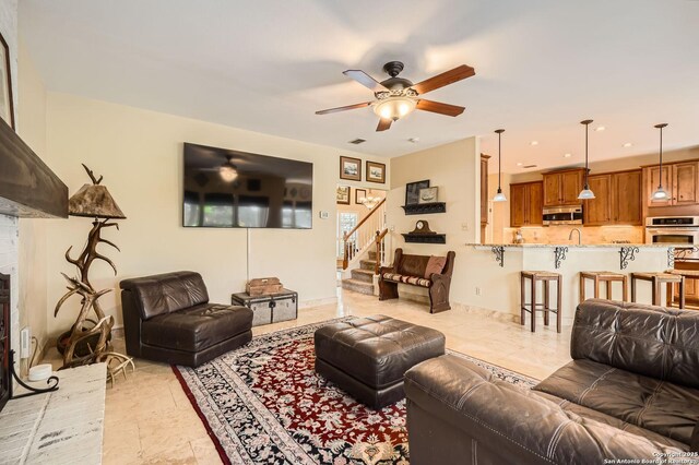 1802 Fallow Run, San Antonio, TX 78248 - living area with stairs, ceiling fan, recessed lighting, and baseboards