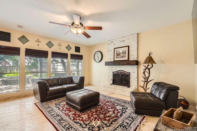 1802 Fallow Run, San Antonio, TX 78248 - living area featuring ceiling fan and a fireplace