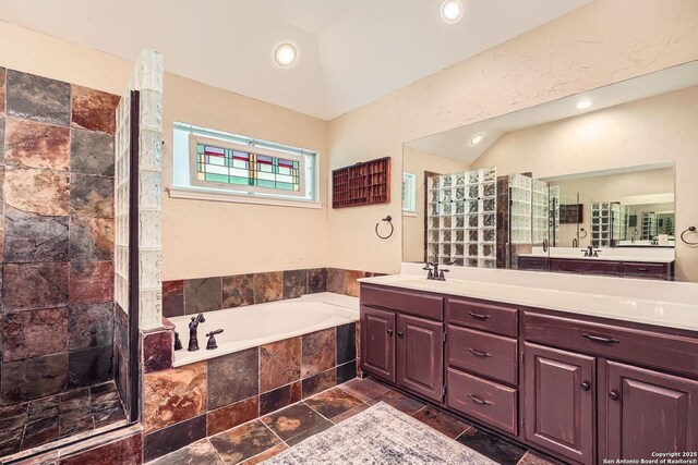 1802 Fallow Run, San Antonio, TX 78248 - full bathroom featuring double vanity, a bath, a tile shower, recessed lighting, and vaulted ceiling