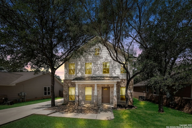 543 Willow Grove Dr, San Antonio, TX 78245 - back of house at dusk with a yard
