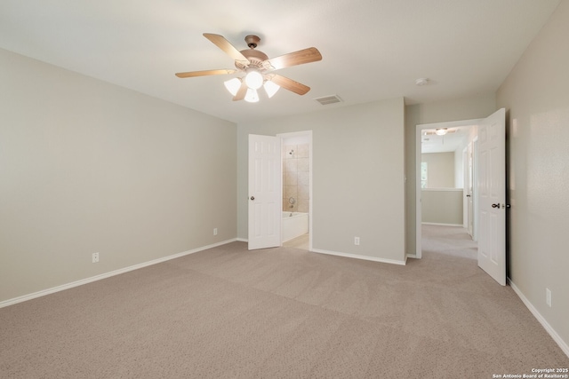 543 Willow Grove Dr, San Antonio, TX 78245 - unfurnished bedroom with light carpet, baseboards, and ceiling fan