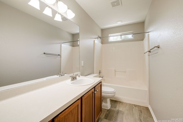 543 Willow Grove Dr, San Antonio, TX 78245 - bathroom with toilet, vanity, wood finished floors, and shower / bath combination