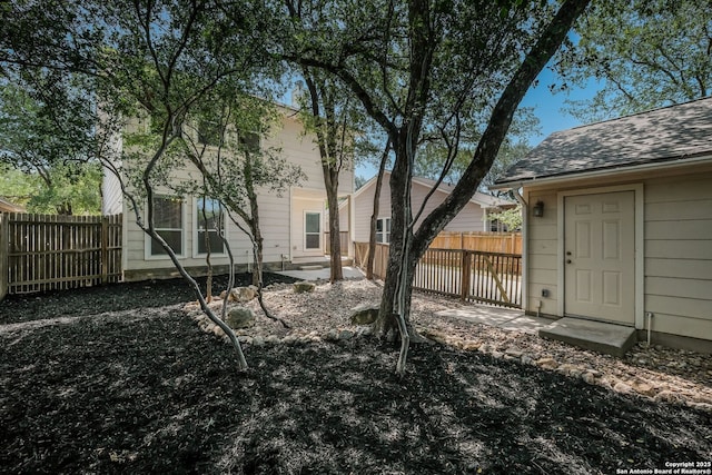 543 Willow Grove Dr, San Antonio, TX 78245 - fenced backyard with a patio