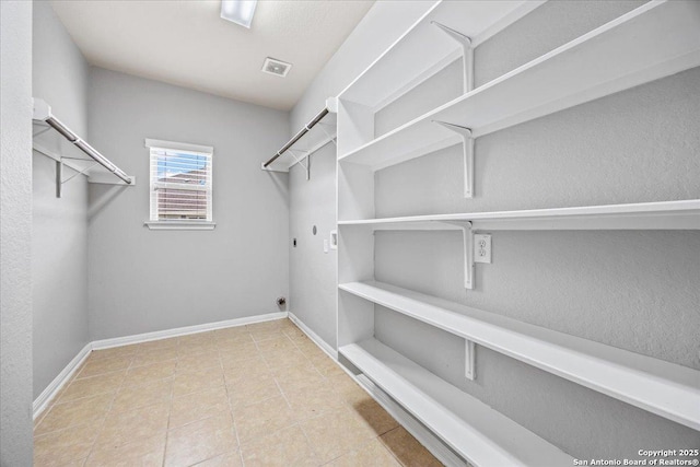 12012 Ivy Post, Schertz, TX 78154 - spacious closet featuring tile patterned floors