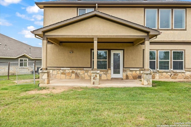 12012 Ivy Post, Schertz, TX 78154 - back of property featuring stucco siding, stone siding, and a patio area