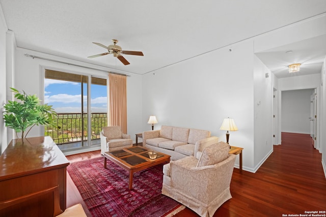 1 Towers Park Unit 1001, San Antonio, TX 78209 - living room with wood finished floors, a ceiling fan, and baseboards