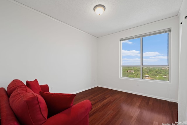 1 Towers Park Unit 1001, San Antonio, TX 78209 - living area featuring dark wood-style floors, baseboards, and crown molding