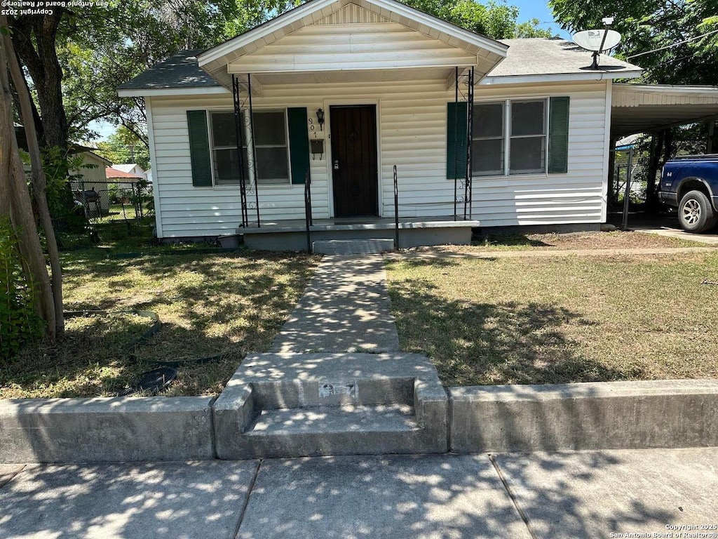 907 Recio, San Antonio, TX 78225 - view of front of house with a porch and an attached carport