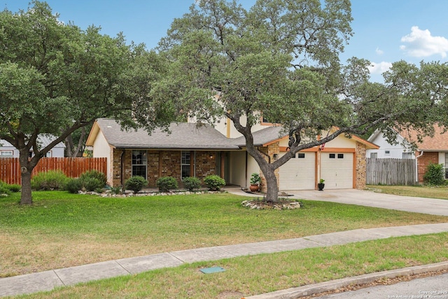 12102 Cherry Blossom, San Antonio, TX 78247 - view of front facade featuring concrete driveway, an attached garage, a chimney, and brick siding