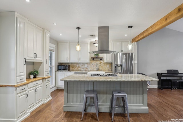 12102 Cherry Blossom, San Antonio, TX 78247 - kitchen featuring stainless steel appliances, island range hood, white cabinets, backsplash, and dark wood finished floors