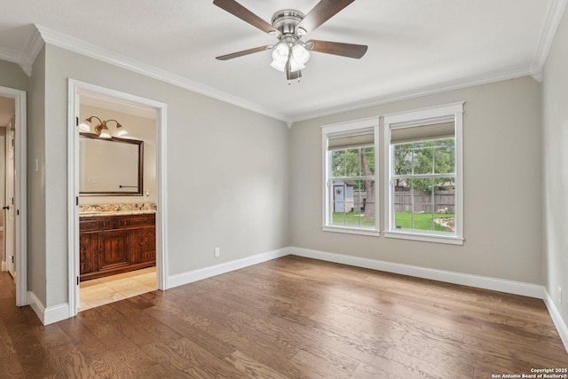 12102 Cherry Blossom, San Antonio, TX 78247 - unfurnished bedroom with ornamental molding, wood finished floors, baseboards, connected bathroom, and ceiling fan