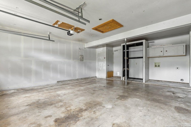 12102 Cherry Blossom, San Antonio, TX 78247 - garage with a garage door opener and electric panel