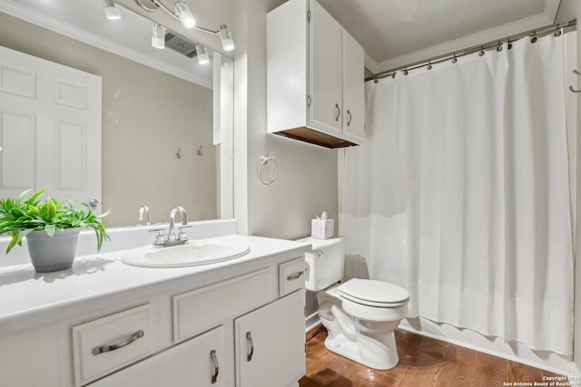 12102 Cherry Blossom, San Antonio, TX 78247 - full bath featuring vanity, toilet, ornamental molding, wood finished floors, and curtained shower
