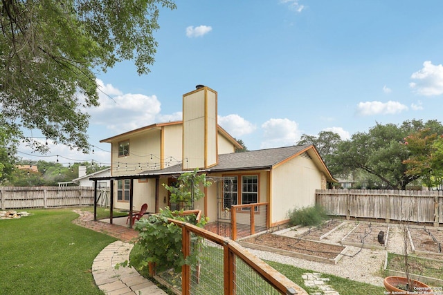 12102 Cherry Blossom, San Antonio, TX 78247 - rear view of property with a garden, a chimney, and a patio