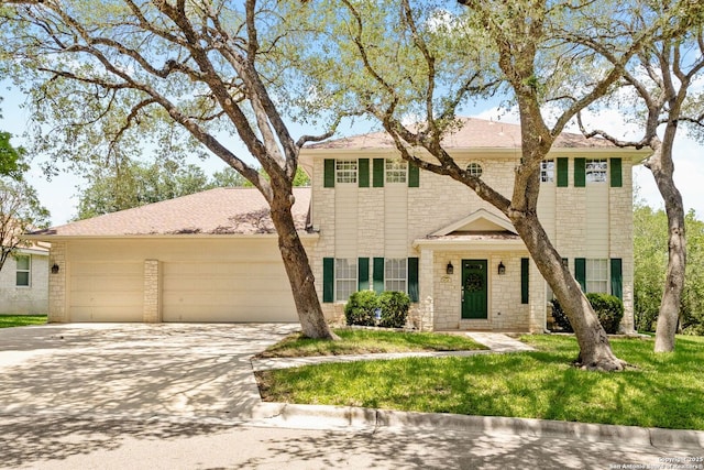 557 Timber Holw, New Braunfels, TX 78132 - view of front of home with concrete driveway, an attached garage, brick siding, and a front lawn