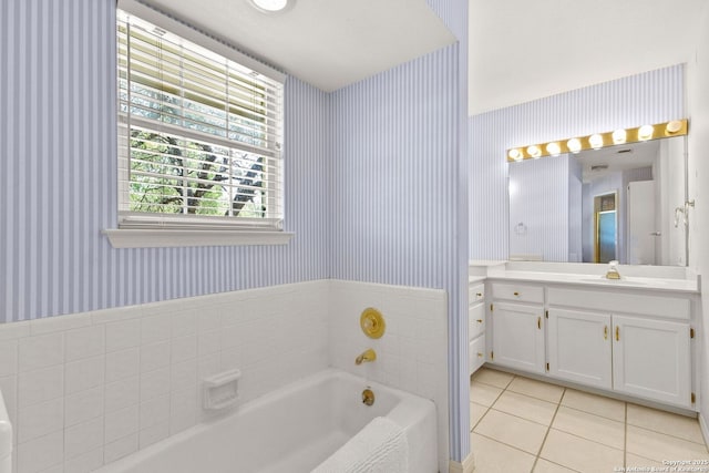 557 Timber Holw, New Braunfels, TX 78132 - full bathroom featuring wallpapered walls, tile patterned floors, a garden tub, and vanity