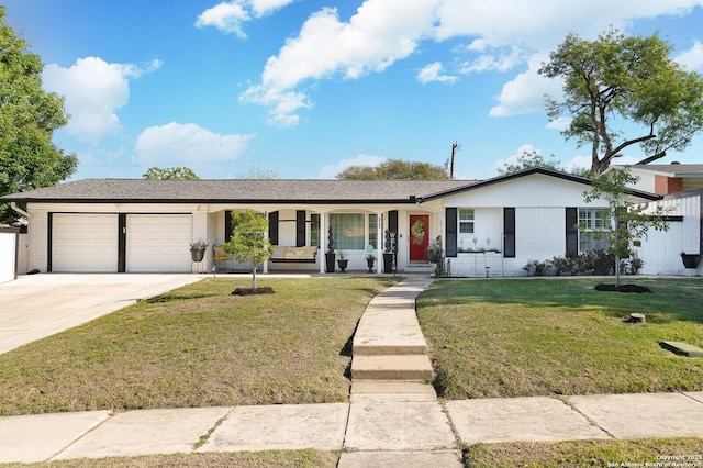 311 Redcliff, San Antonio, TX 78216 - single story home featuring an attached garage, covered porch, brick siding, a front lawn, and driveway
