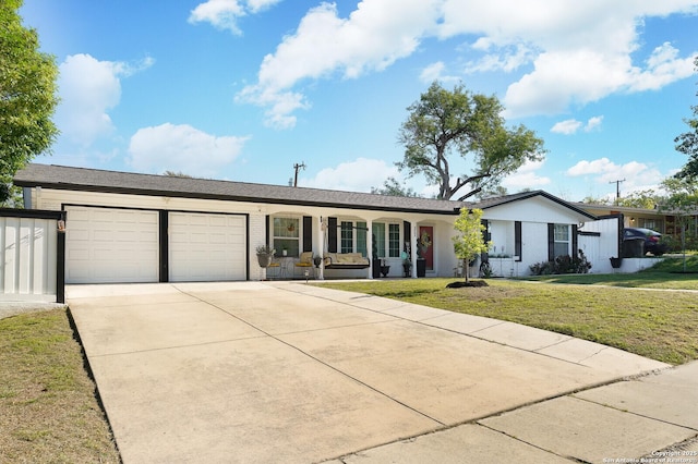 311 Redcliff, San Antonio, TX 78216 - single story home with an attached garage, a front lawn, concrete driveway, a porch, and brick siding