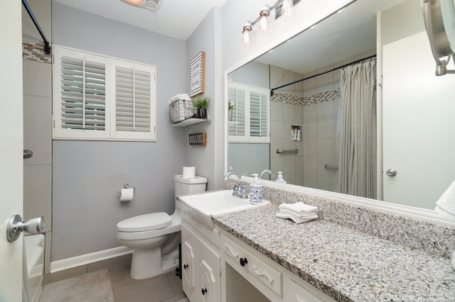 311 Redcliff, San Antonio, TX 78216 - bathroom with vanity, toilet, tile patterned floors, baseboards, and shower / bath combo with shower curtain