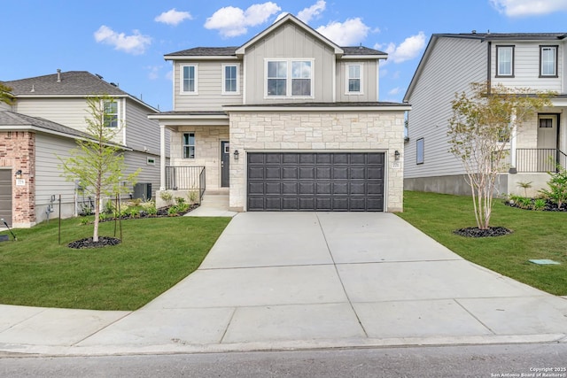 771 Fort Leonard, San Antonio, TX 78245 - craftsman-style house featuring stone siding, board and batten siding, an attached garage, a front lawn, and concrete driveway