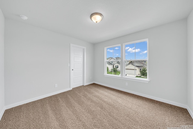 771 Fort Leonard, San Antonio, TX 78245 - empty room featuring baseboards, carpet floors, and a smoke detector