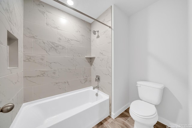 771 Fort Leonard, San Antonio, TX 78245 - bathroom with toilet, shower / tub combination, baseboards, and wood finished floors