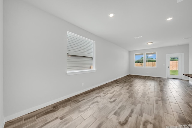 771 Fort Leonard, San Antonio, TX 78245 - empty room featuring wood finished floors, baseboards, and recessed lighting