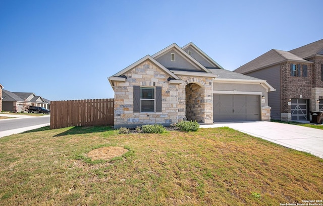 14755 Grey Egret Run, San Antonio, TX 78253 - view of front of house with a garage, concrete driveway, and stone siding